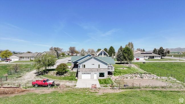 View of front facade with a garage | Image 6