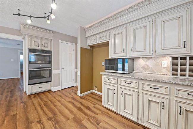 Check out the crown molding! You don't find this detail work in many newer houses. | Image 11