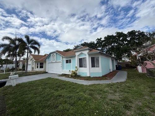 1034 W Jasmine Ln, North Lauderdale, FL, 33068-3940 | Card Image