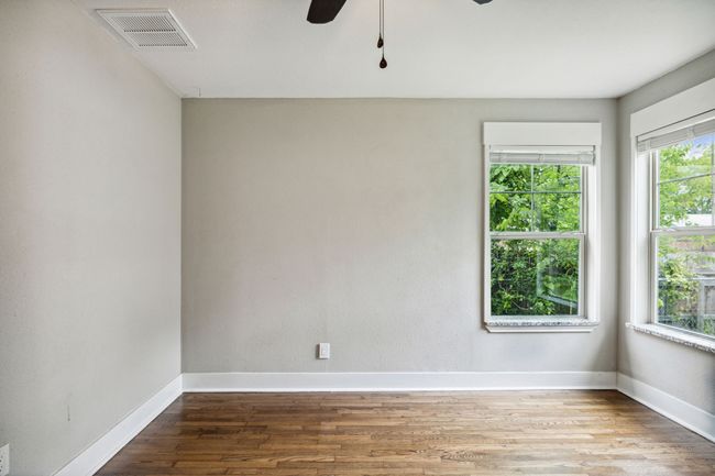 Empty room featuring wood finished floors and ceiling fan | Image 22