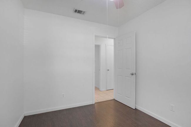 Third Bedroom with a ceiling fan | Image 25