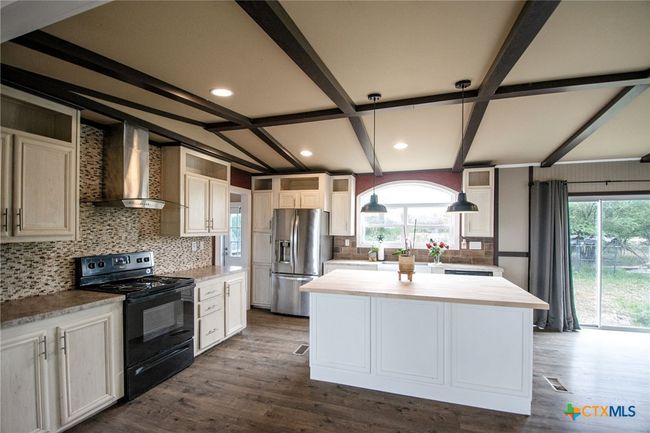 488 Union Wine Rd, Home with 4 bedrooms, 2 bathrooms and null parking in New Braunfels TX | Image 12