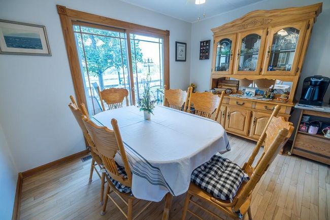 Dining space featuring light hardwood / wood-style flooring | Image 17