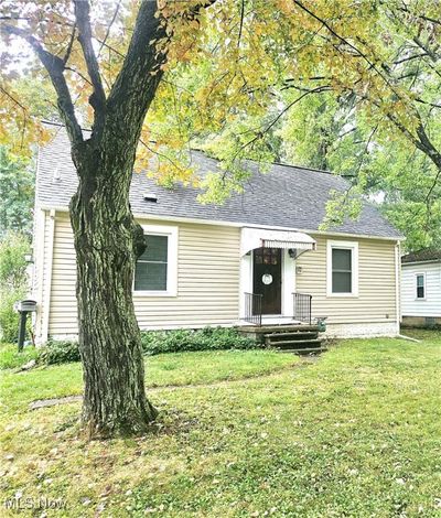 View of front of home with a front yard | Image 1