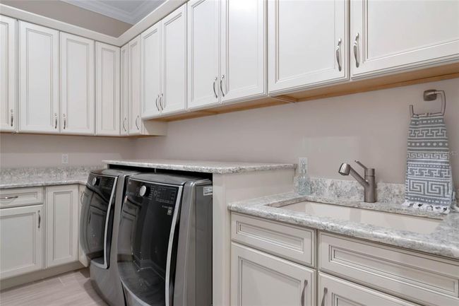 Laundry Room with Extra Cabinets for Storage | Image 49