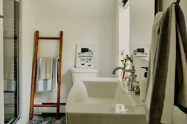 Bathroom with baseboard heating and tiled shower | Image 24