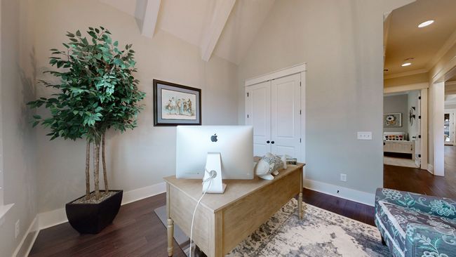 Work from home in style—this vaulted office offers privacy, natural light, and beautiful architectural details that make productivity feel effortless. | Image 25