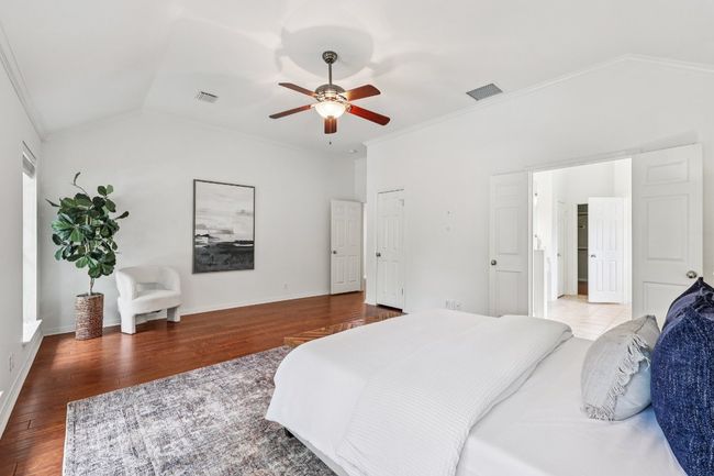 Wake up to tree-top views and a peaceful atmosphere in the serene primary bedroom. | Image 8