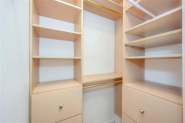 Walk-in closet in Bedroom | Image 12