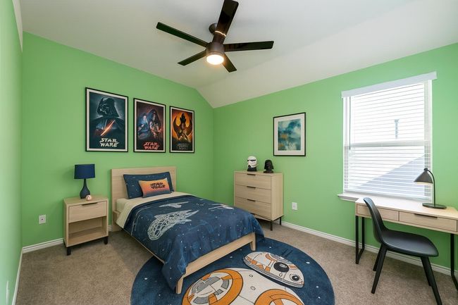 Bedroom featuring carpet floors, a ceiling fan, and lofted ceiling | Image 25