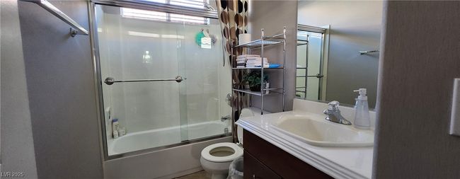 Full bathroom with vanity and enclosed tub / shower combo | Image 14