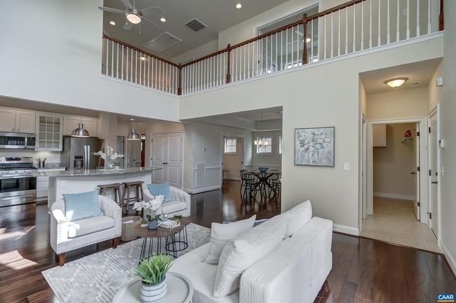 Great room open to hall above. | Image 17