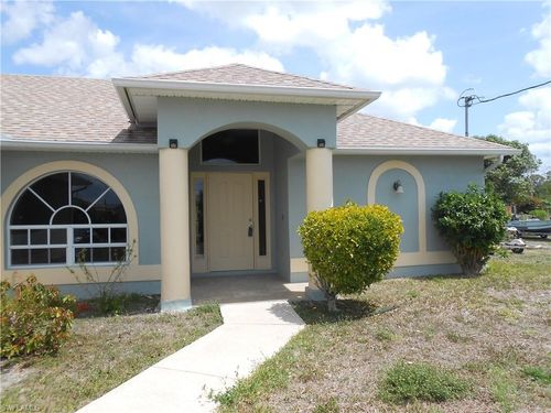 407 Chamonix Ave S, LEHIGH ACRES, FL, 33974-5982 | Card Image