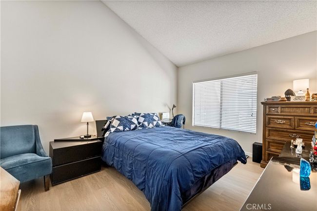 Large bright suite with vaulted ceilings and a large walk-in closet. | Image 15