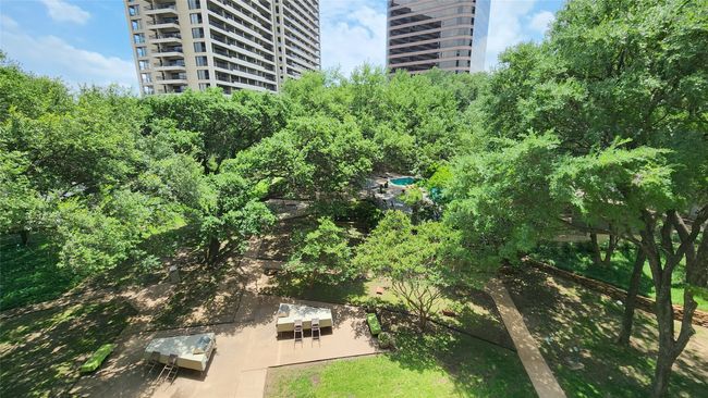 Unit balcony's view of exterior community amenities. | Image 15