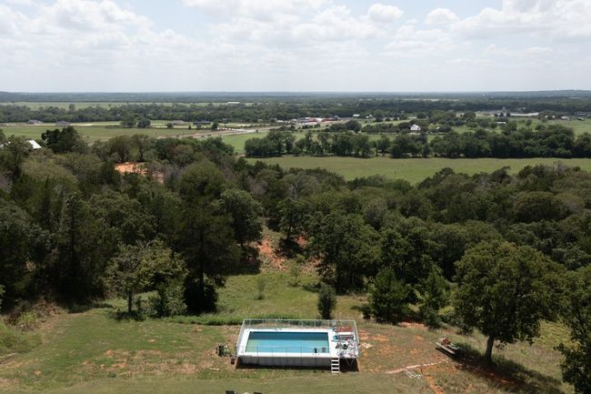 Aerial view of property and surrounding area featuring a pool | Image 6