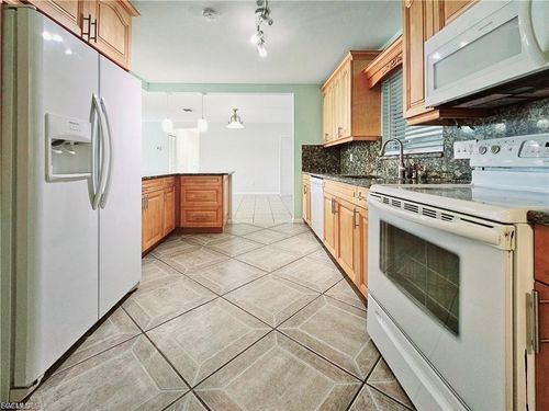 211 S Lake Dr, LEHIGH ACRES, FL, 33936-7039 | Card Image