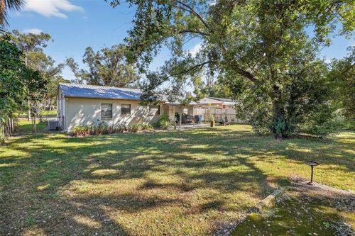 1422 W Bogie Dr, Tampa, FL, 33612-7326 | Card Image