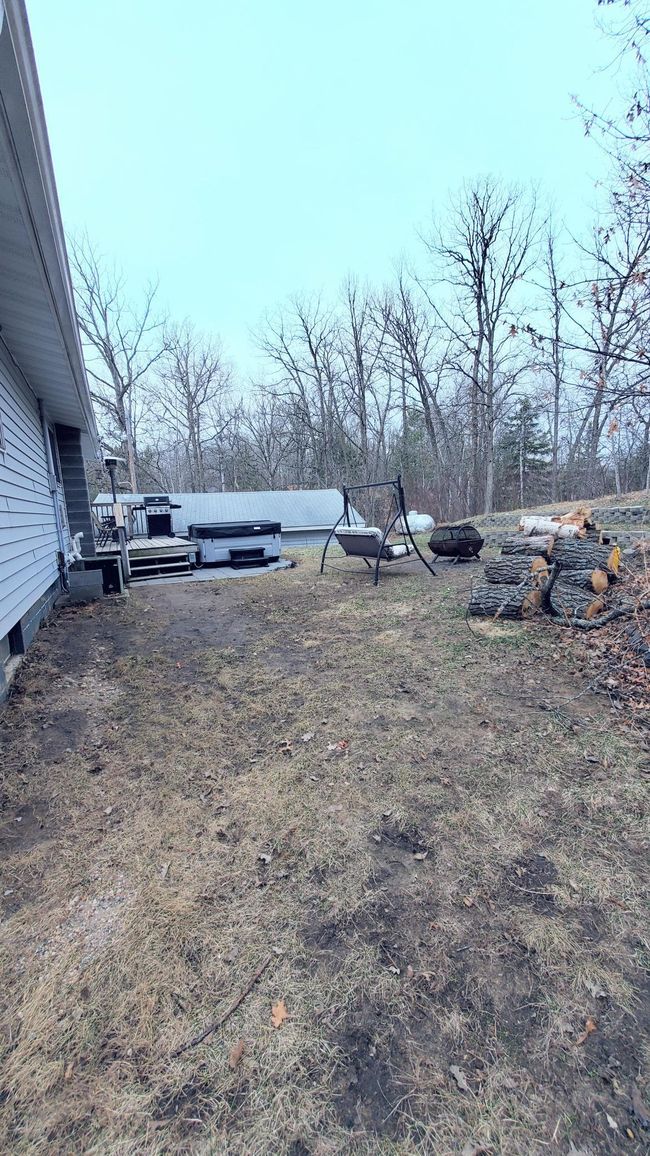 deck off of the back of the home | Image 25