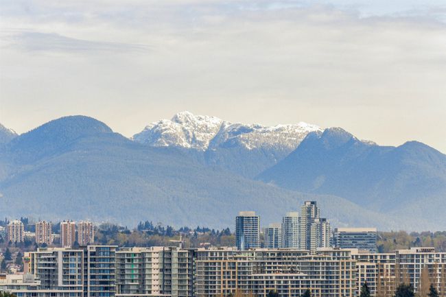 Mountain view with nearby urban area | Image 20