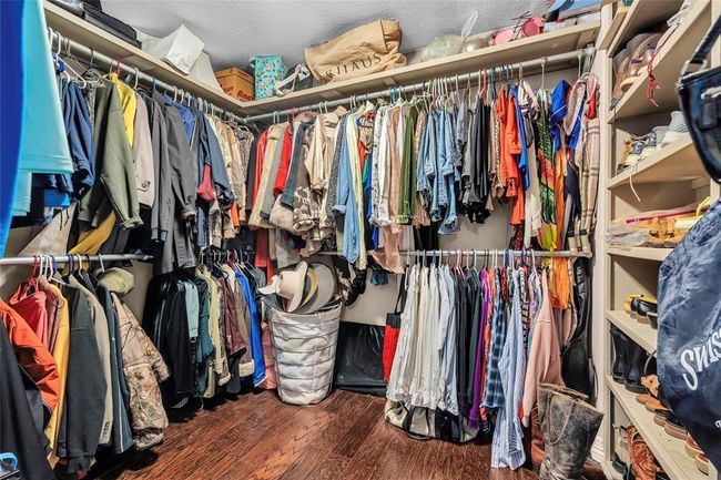 Spacious closet featuring wood finished floors | Image 27