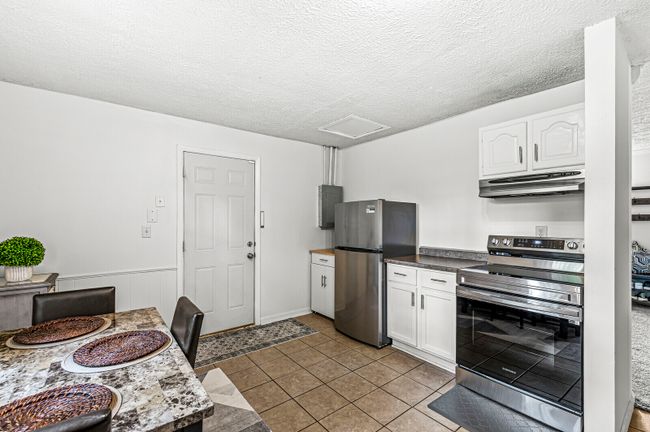 Spacious eat-in kitchen. The oven/range is new in 2024 and the refrigerator was replaced in 2022 | Image 4