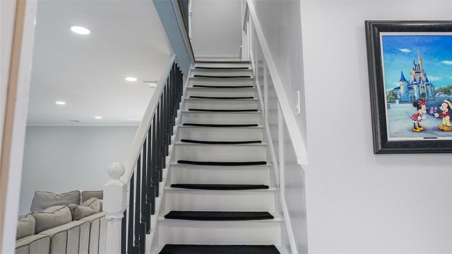 Staircase featuring crown molding and recessed lighting | Image 7