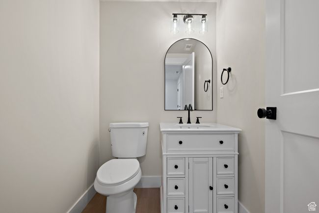Bathroom with vanity and wood finished floors | Image 18