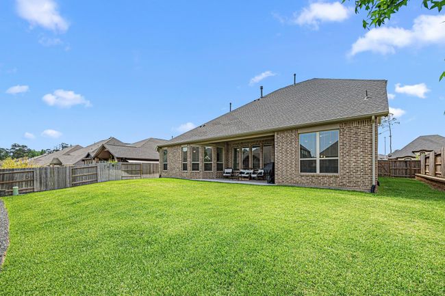 Even more outdoor space on the other side of the yard. Would be perfect for a small garden. | Image 47