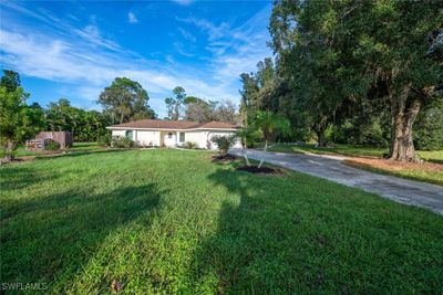 View of front facade with a front lawn | Image 2