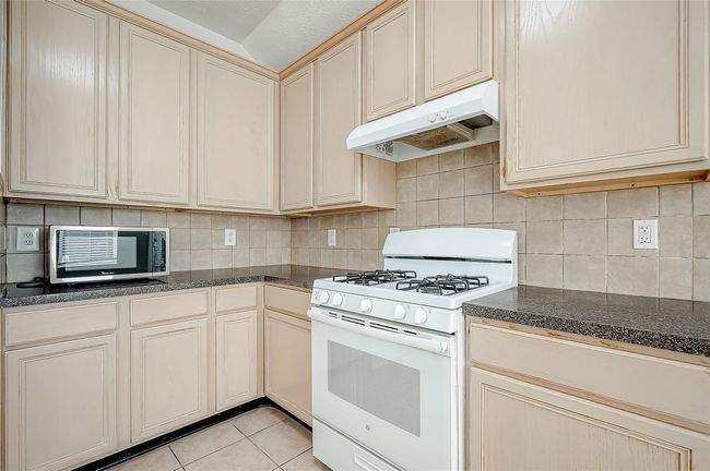 Lots of cabinet space for all of your dishes and appliances. | Image 12