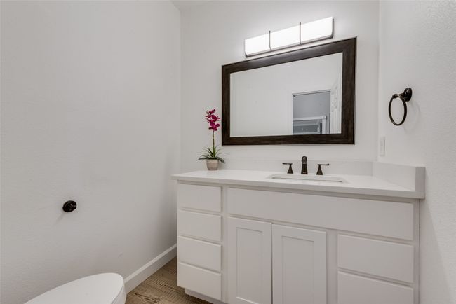 Half bathroom with vanity and toilet | Image 14