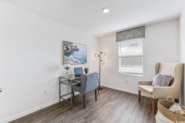 Office space with wood finished floors | Image 19