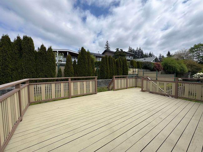 Wooden terrace featuring fence | Image 8