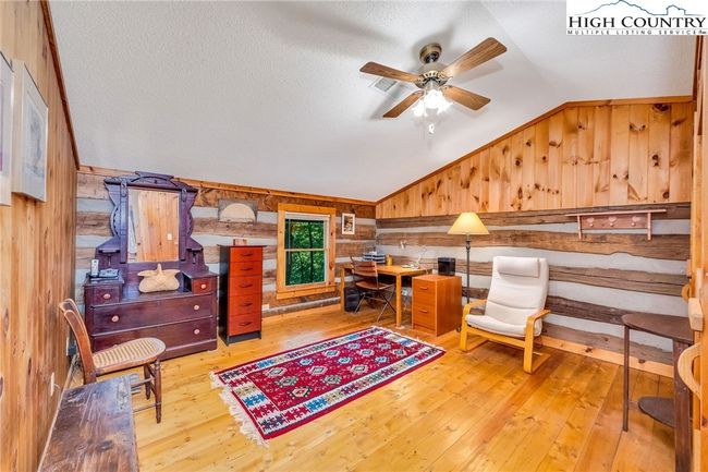 Currently styled as an office, the first bedroom easily converts into a spacious guest haven. | Image 18