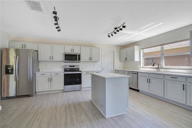 1375 Willow Wind Dr, House other with 4 bedrooms, 3 bathrooms and null parking in Clermont FL | Image 11