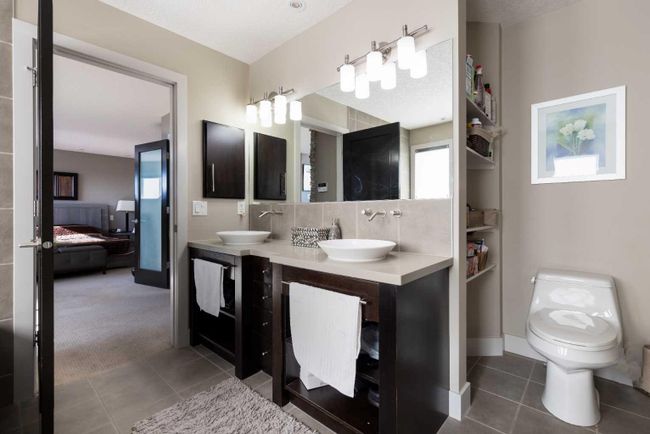 67 Tusslewood View Nw, Home with 4 bedrooms, 3 bathrooms and 4 parking in Calgary AB | Image 23