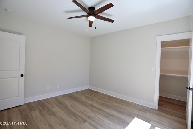 Split bedroom plan - Main level Guest room w/walk-in closet | Image 28