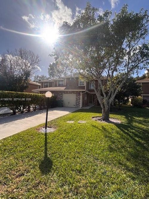 6183 Pine Tree Ln, Tamarac, FL, 33319-8103 | Card Image