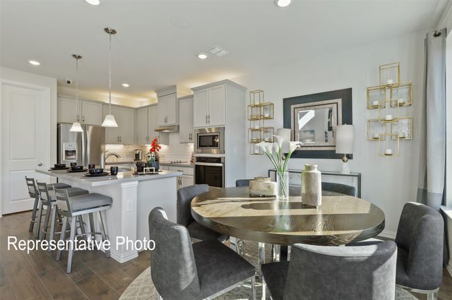 Dining room with visible vents, baseboards, dark wood-style floors, and recessed lighting | Image 4