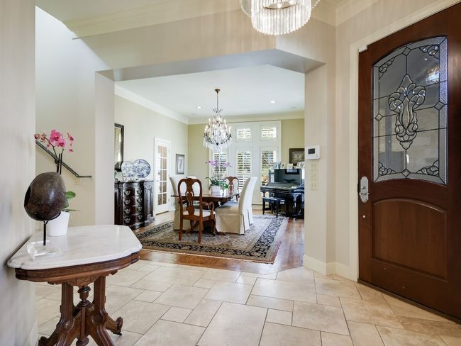 Foyer with a chandelier, ornamental molding, recessed lighting, and baseboards | Image 5