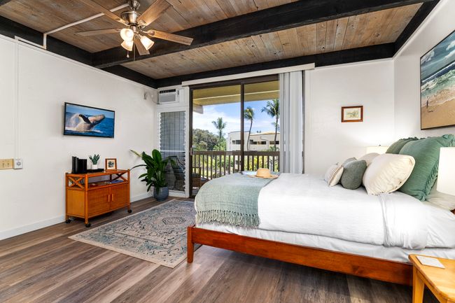 New luxury vinyl plank flooring enhances the light, airy island vibe | Image 5