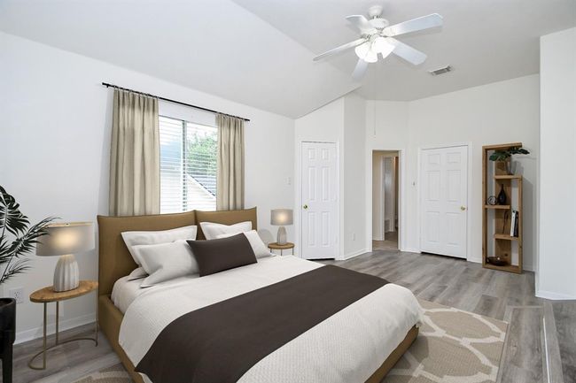 Bedroom #2 measures 11' x 19' - plenty of space to add and rearrange furniture as you wish! It is complete with a large window to let in light, a ceiling fan, and spacious closet. | Image 26