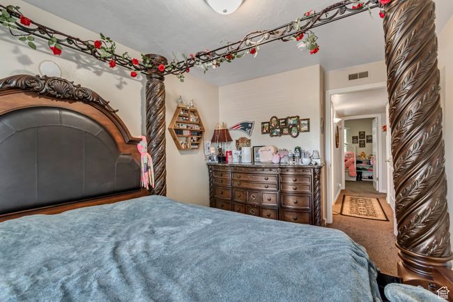 View of carpeted bedroom | Image 14