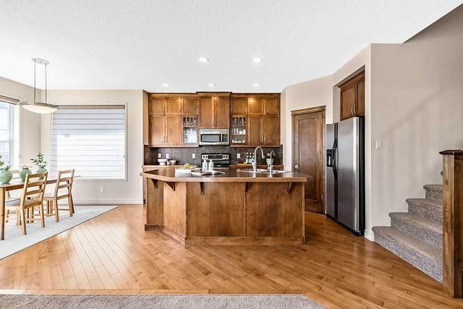 419 Cimarron Blvd, House other with 3 bedrooms, 3 bathrooms and 4 parking in Okotoks AB | Image 10