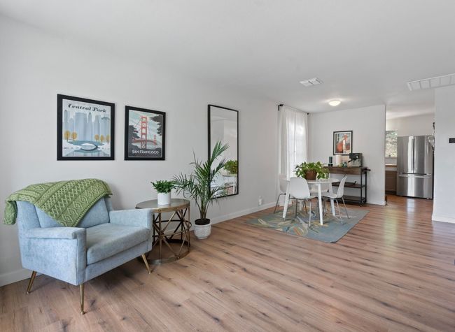 Living area flows easily into dining space | Image 5