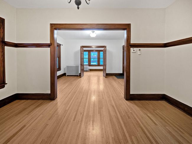 Great flow from kitchen to dining, living and sun rooms. | Image 15