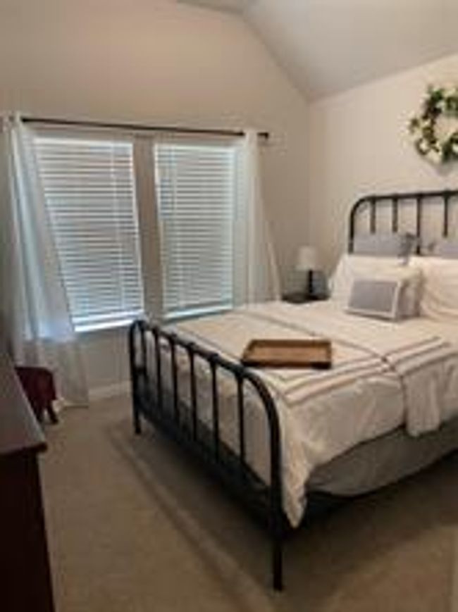 Bedroom with vaulted ceiling | Image 16