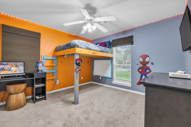 Carpeted bedroom with baseboards and ceiling fan | Image 13