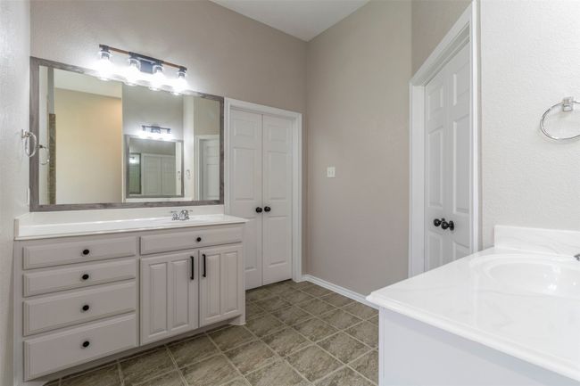 Full bathroom featuring baseboards and vanity | Image 29